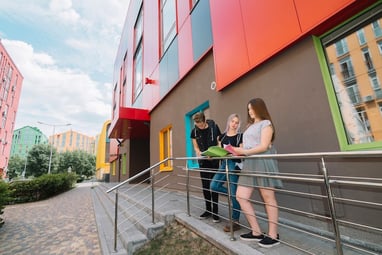 students-outside-university_23-2147666469